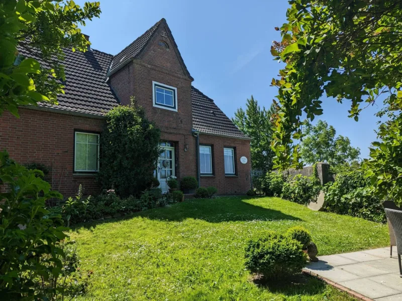 Swanen Hus am Meer mit Garten